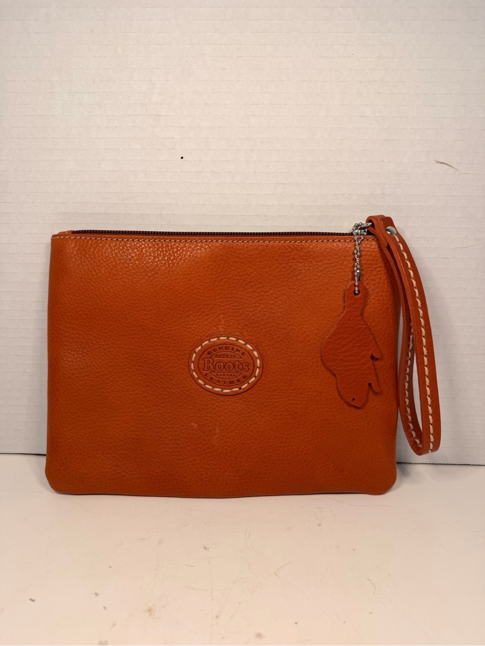 Roots Canada Orange
Genuine Leather Wristlet
Clutch with MB80 Embroid